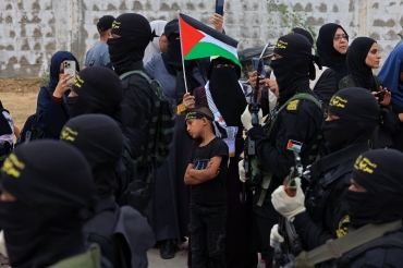 Des-militants-palestiniens-du-mouvement-Jihad-islamique-participent-a-un-defile-militaire-anti-israelien-marquant-le-36e-anniversaire-de-la-fondation-du-mouvement-dans-la-ville-de-Gaza-le-4-octobre-2023-1729270.jpg